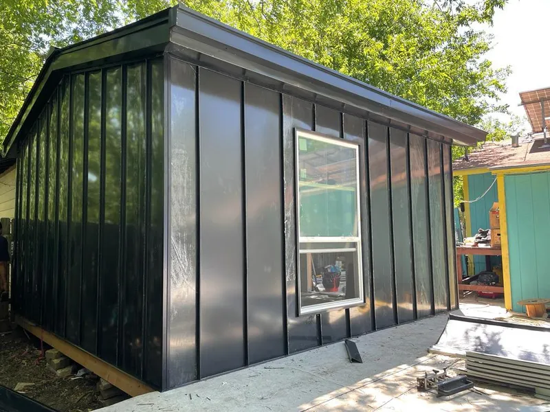 Black standing seam metal wall panels for Metal Roof Installation in Winter Garden