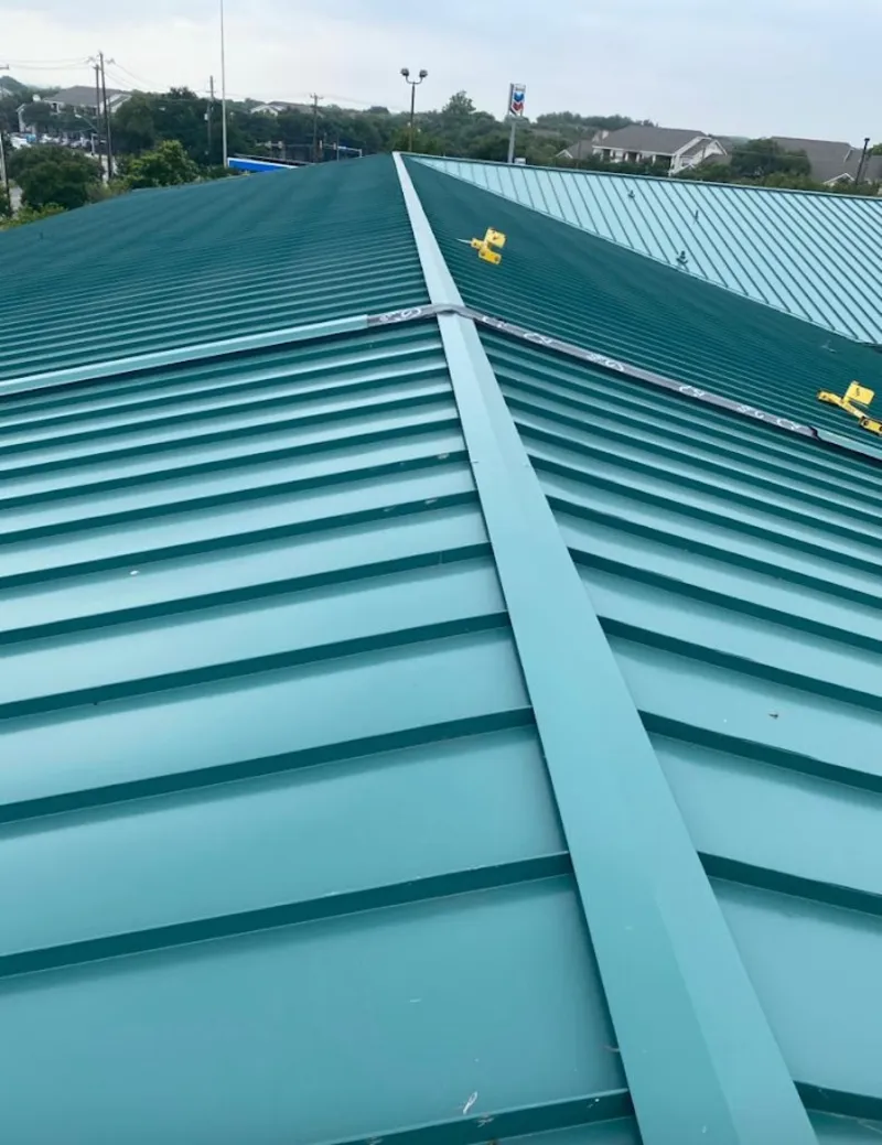 Green commercial metal roof ridge and valley for Metal Roof Repair in Winter Garden